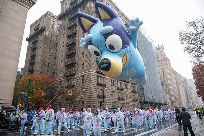 KENA BETANCUR / GETTY IMAGES via TRIBUNE
The Bluey balloon floats in the annual Macys Thanksgiving Day Parade on Nov. 28 in New York. The popular animated childrens series Bluey is being made into a 2027 feature film.